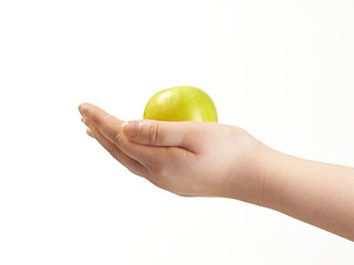 Image showing Apple in the palms og childs hands