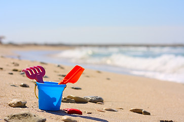 Image showing Plastic bucket on the beach