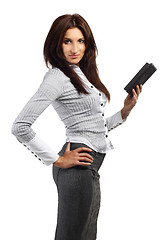 Image showing Young woman stands with electronic book