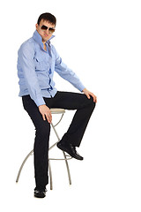 Image showing Guy sitting on the chair