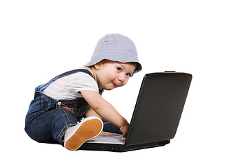 Image showing Little boy with a laptop