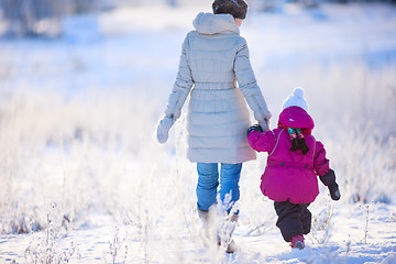 Image showing Mother and daughter on winter day