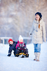 Image showing Family outdoors at winter