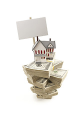 Image showing Small House on Stacks of Hundred Dollar Bills and Blank Sign