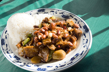 Image showing Chinese food roast pork hot pepper sauce and peanuts