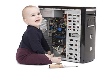 Image showing young child wit screwdriver and ram