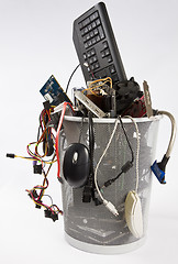 Image showing electronic scrap in trash can