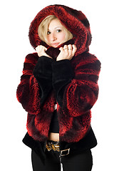 Image showing Portrait of smiling blond woman in fur jacket