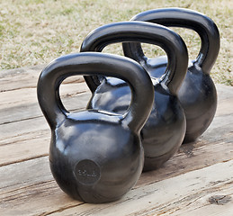 Image showing black iron kettlebells