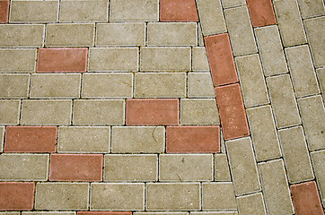 Image showing City sidewalk lined with small tile background 