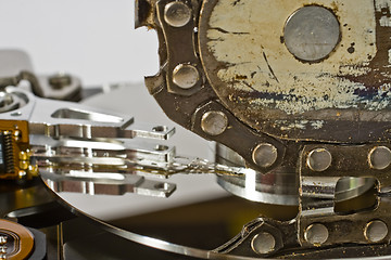 Image showing Chain saw and hard drive