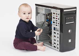 Image showing young child with open computer