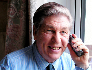 Image showing Grey man on Telephone