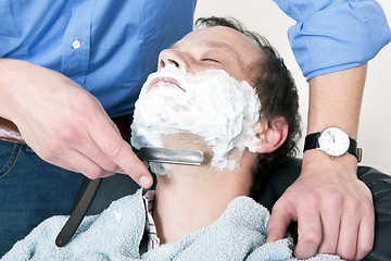 Image showing Being shaved