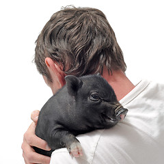 Image showing liitle piggy and man