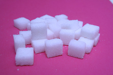 Image showing sugar on pink background