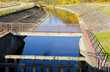 Image showing River dam and reflections on water background 
