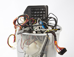 Image showing electronic scrap in trash can