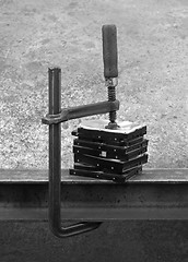 Image showing compressed stack of hard disks-black and white shot