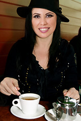 Image showing Female having a cup of tea