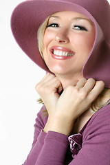 Image showing Happy smiling woman in large brimmed sunhat