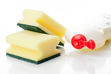 Image showing Yellow kitchen sponges and bottle of dishwashing liquid