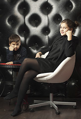 Image showing Young girl on a chair.