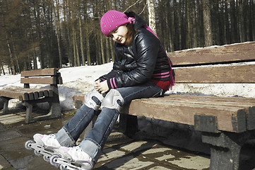 Image showing Girl on a bench