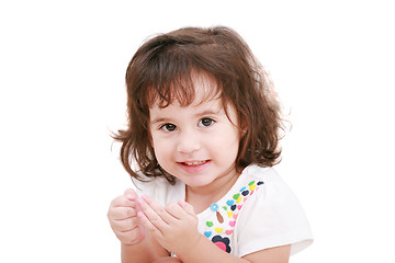 Image showing 2 years old girl smiling and looking at the camera