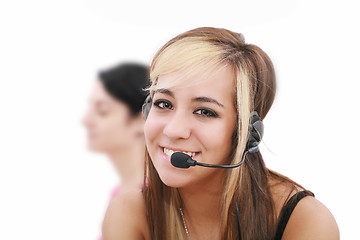 Image showing Beautiful representative smiling call center woman with headset.