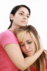 Image showing Sadness woman in friends arms, isolated on white