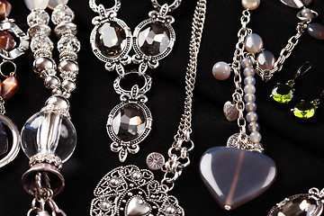 Image showing Necklaces and accessories on black background