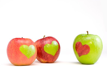 Image showing three apples with hearts