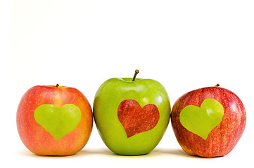 Image showing three apples with hearts