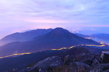 Image showing mountain at night with road