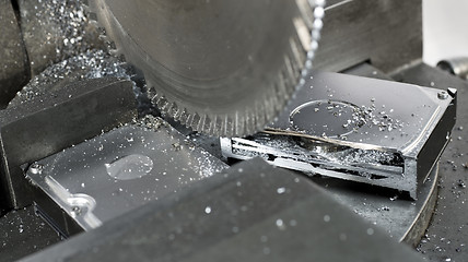 Image showing circular saw in close up, to abolish a  hard disk