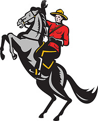 Image showing Canadian Mounted Police Mountie Riding Horse