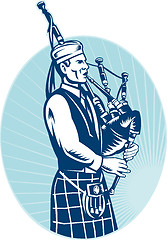 Image showing Bagpiper Playing Scottish Great Highland Bagpipe