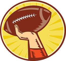 Image showing American Football Player Hand Catching Throwing Ball