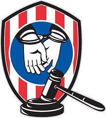 Image showing Gavel handcuff hand American stripes shield
