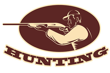 Image showing hunter shooting aiming shotgun rifle