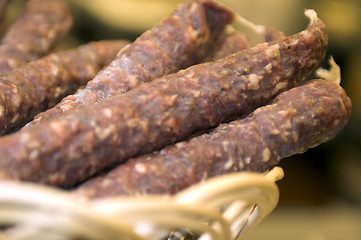 Image showing sausage in wicker basket