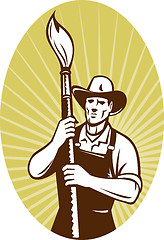 Image showing cowboy painter with paintbrush