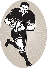 Image showing Rugby player with ball wearing all black