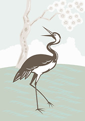 Image showing Crane looking up tree in background