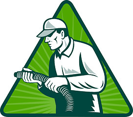 Image showing tradesman home insulation technician with hose