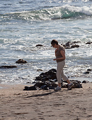 Image showing Woman beachcomb on Glass Beach