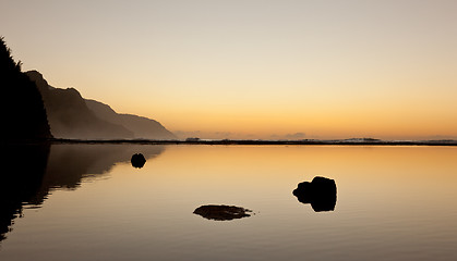 Image showing Misty sunset on Na Pali coastline