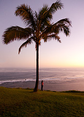 Image showing Woman watching sunrise in Kauai