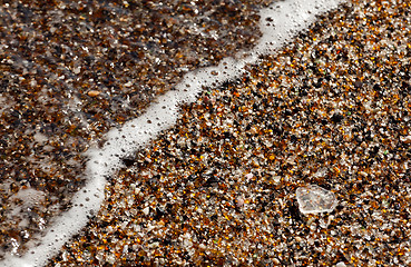 Image showing Closeup of glass fragments on beach